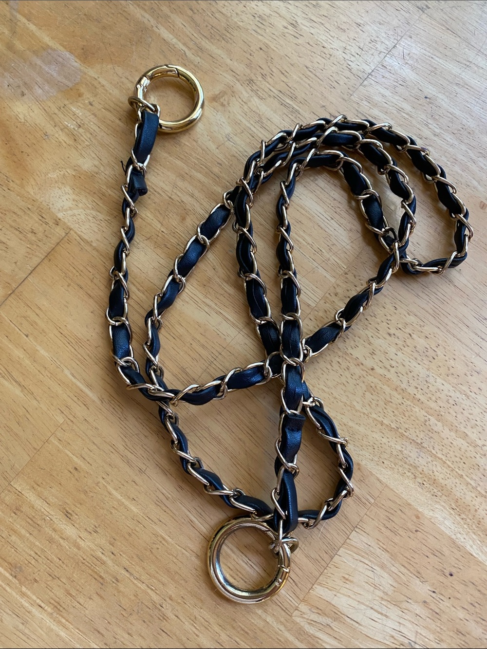 Black color gold tone hardware strap for bag